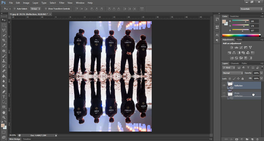 click the Reflection layer and drag it below the Photo layer