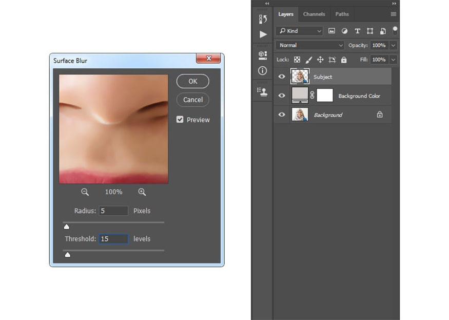 Surface Blur and set Radius to 5 px and Threshold to 15.